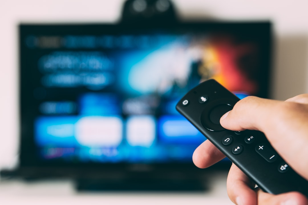 Amazon Fire TV Stick 4K Plus and Max with colorful interface and remote control