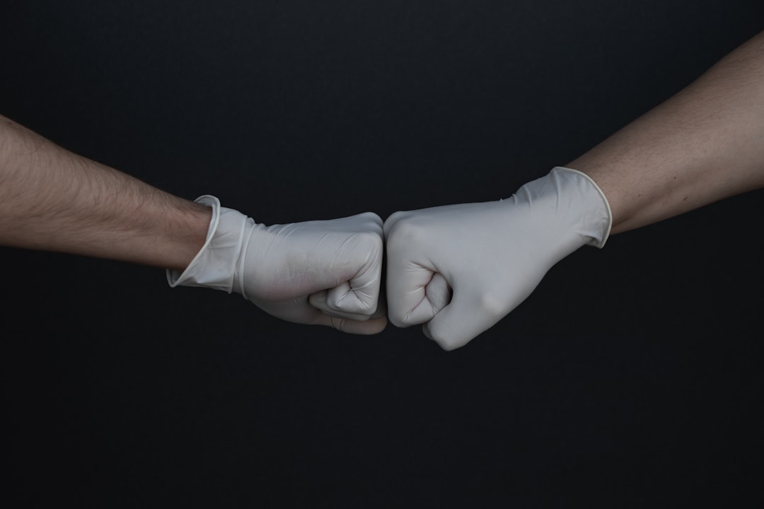 ICE agents with electrified gloves
