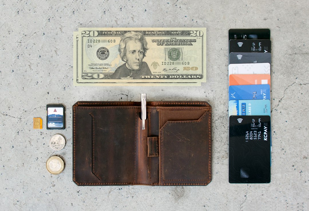 OhSnap Modular Wallet attached to a phone with a phone stand