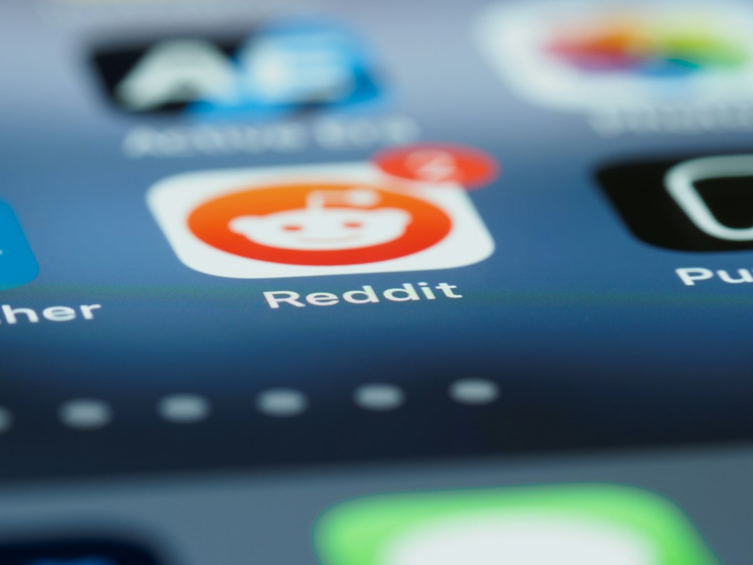 Reddit logo on a screen showing a login prompt
